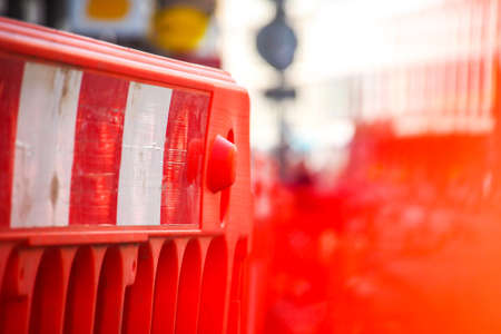Road construction works in the city street. A road construction hinders traffic in a city.の写真素材