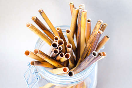 Zero waste reed drinking straws in glass jarの写真素材