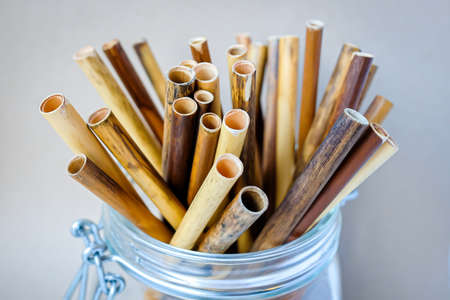 Zero waste reed drinking straws in glass jarの写真素材