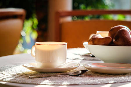 Cup of coffee and croissants on table in coffee shop. Selective focusの写真素材