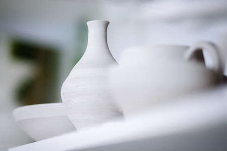 Minimalistic and futuristic high-end ceramics pottery artists workshop. Selective focusの写真素材