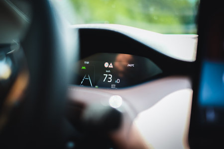 Madona, Latvia - July 20, 2021: New Skoda Enyaq IV, a SUV electric car. Defocusedのeditorial素材