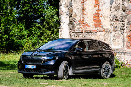 Madona, Latvia - July 20, 2021: New Skoda Enyaq IV, a SUV electric car. Defocusedのeditorial素材