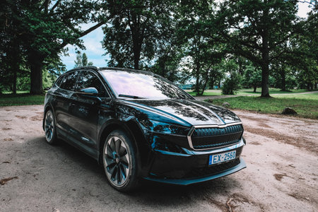 Madona, Latvia - July 20, 2021: New Skoda Enyaq IV, a SUV electric car. Defocusedのeditorial素材