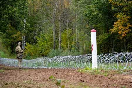 Indra, Latvia - September 28, 2021: Latvia - Belarus border, where Latvian State Border Guard and...