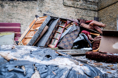 Construction waste. Broken furniture and household waste during the reconstruction of the apartment. Illegal dumping. Selective focusの写真素材