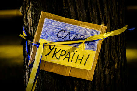 Riga, Latvia - February 26, 2022: Protest against the Russian invasion in Ukraine at the Russian Embassy in Riga, Latvia. Defocusedのeditorial素材