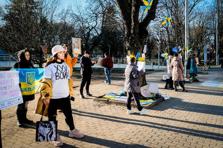 Riga, Latvia - February 28, 2022: Protest against the Russian invasion in Ukraine at the Russian Embassy in Riga, Latvia. Defocusedのeditorial素材
