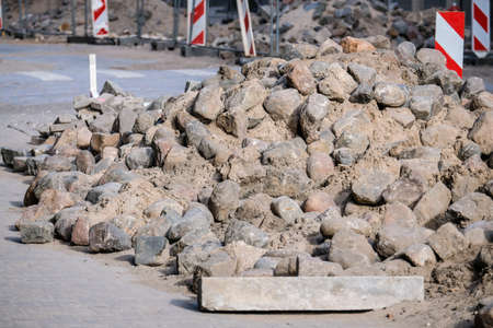 Road works. Stack with cobblestone, paving. Selective focusの写真素材