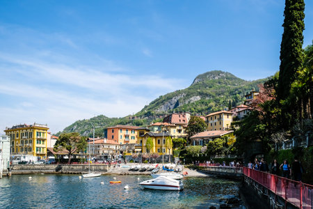 Varenna, Italy - April 15, 2022: Como Lake and town of Varenna waterfront, Lombardy region of Italyのeditorial素材