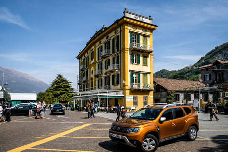 Varenna, Italy - April 15, 2022: Como Lake and town of Varenna waterfront, Lombardy region of Italy. Dacia Dusterのeditorial素材
