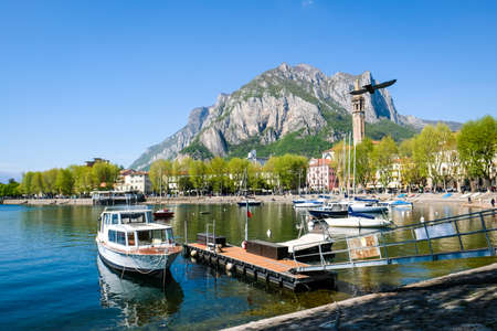 Lecco, Italy - April 15, 2022: Como Lake and town of Lecco waterfront, Lombardy region of Italyのeditorial素材