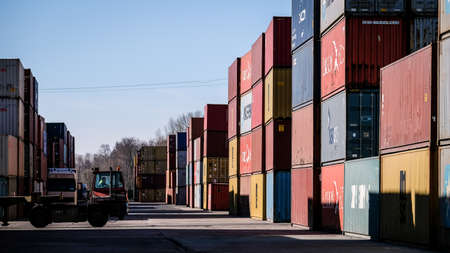 Riga, Latvia - April 20, 2022: Baltic Container Terminal in Freeport of Riga. Riga harbour, Latvia. Container ships in a portのeditorial素材