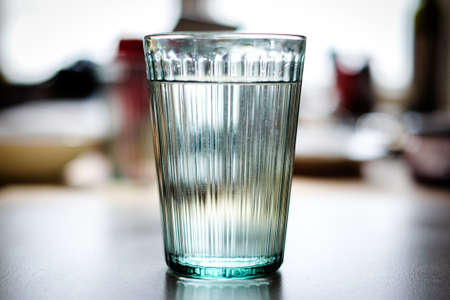 Glass of still water. Defocusedの写真素材