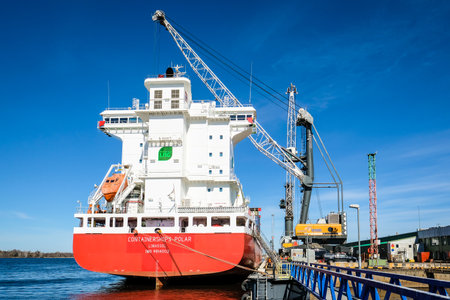 Riga, Latvia - April 20, 2022: Baltic Container Terminal in Freeport of Riga. Riga harbour, Latvia. Container ships in a port. Defocusedのeditorial素材