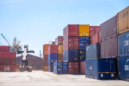 Riga, Latvia - April 20, 2022: Baltic Container Terminal in Freeport of Riga. Riga harbour, Latvia. Container ships in a port. Defocusedのeditorial素材