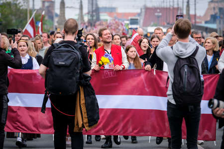 Riga, Latvia - May 20, 2022: Latvian protests agains Soviet legacy and Victory Memorial monument to Soviet Army in Riga which is to be demolished. Selective focus.のeditorial素材
