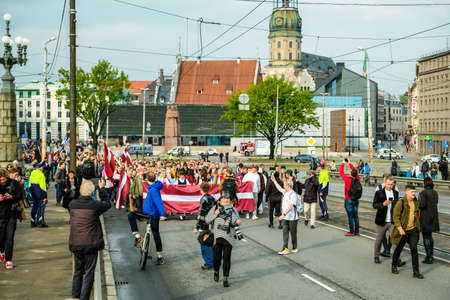 Riga, Latvia - May 20, 2022: Latvian protests agains Soviet legacy and Victory Memorial monument to Soviet Army in Riga which is to be demolished. Selective focus.のeditorial素材