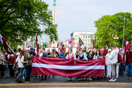 Riga, Latvia - May 20, 2022: Latvian protests agains Soviet legacy and Victory Memorial monument to Soviet Army in Riga which is to be demolished. Selective focus.のeditorial素材