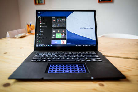 Riga, Latvija - June 8, 2022: The ASUS ExpertBook business laptop. Selective focusのeditorial素材