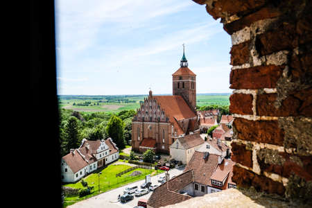 Reszel, Poland - June 12, 2022: Castle and the Church of the Holy Apostles Peter and Paul in historic town Reszel, Polandのeditorial素材