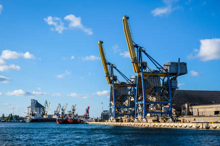 Gdansk, Poland - June 14, 2022: Gdansk port and shipyard. Cranes and ships at the famous shipyard of Gdansk, Poland. Defocused.のeditorial素材