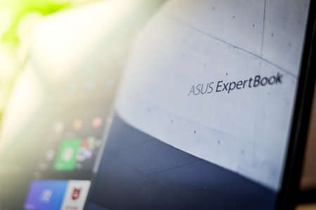 Riga, Latvija - June 8, 2022: The ASUS ExpertBook business laptop. Selective focusのeditorial素材