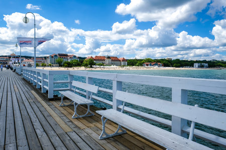 Sopot, Poland - June 15, 2022: Sopot resort in Poland. Wooden pier, molo with marina and beach. Sopot is major tourist destination in Poland.のeditorial素材
