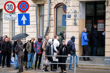 Riga, Latvia - October 1, 2022: Queues at the polling stations in Riga, the capital of Latvia, where the parliamentary elections are heldのeditorial素材