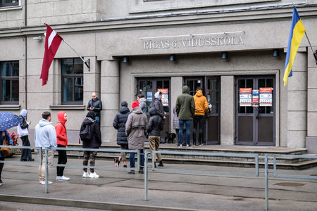 Riga, Latvia - October 1, 2022: Queues at the polling stations in Riga, the capital of Latvia, where the parliamentary elections are heldのeditorial素材