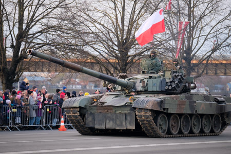 Riga, Latvia - November 18, 2022: Polish main battle tank PT-91 Twardy, s development of the T-72M1 in a army parade in the capital of Latvia, Riga. Defocusedのeditorial素材