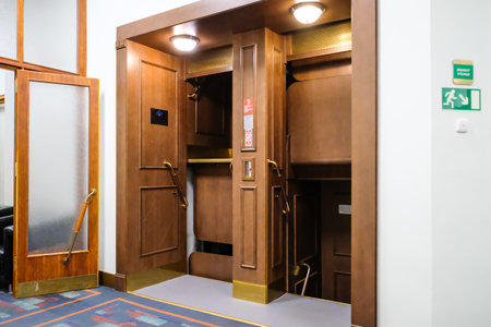 Prague, Czech Republic - December 1, 2022: Historic Paternoster elevator in Prague New Town Hall, Czech Republic. Defocusedのeditorial素材