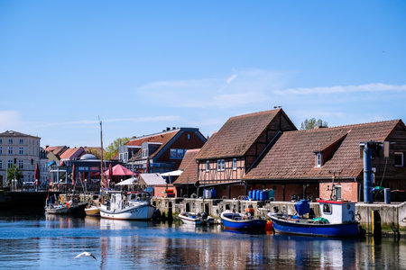 Wismar, Germany - May 8, 2023: Scenic summer outdoor view of the Old Port pier town architecture with ships and boats in Wismar, Germanyのeditorial素材