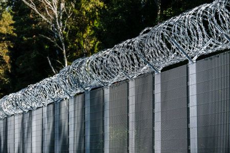 Silene, Latvia - September 26, 2023: Latvia - Belarus border, where where a fence with barbed wire has been erected against the refugees from Belarus.のeditorial素材