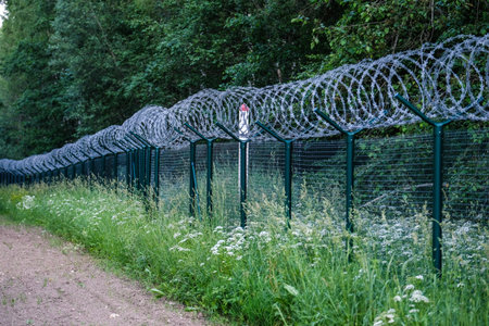 Karsava, Latvia - June 18, 2024: Latvian-Russian border, where Latvia builds fences and...