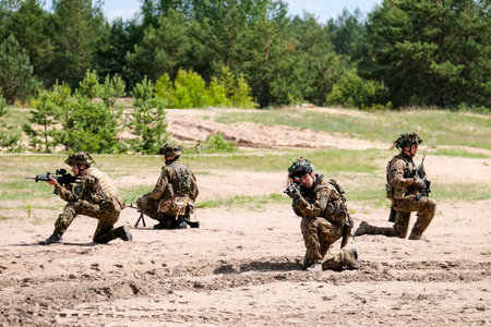 Adazi, Latvia- June 11, 2024: Soldiers and national guardsmen of the Latvian army train with weapons...