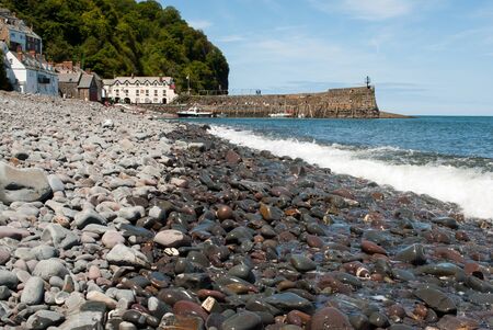 Pebble Beach with Clovelly UK in the backgroundのeditorial素材