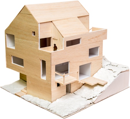 Perspective View Of A House Model  Under Construction  Made From Wood Isolated On Whiteの写真素材