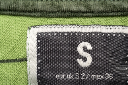 Macro Photo Of A Clothing Label Showing Size S  Small  And Equivalents In Uk and Mexican Sizesの写真素材