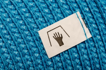 Manual Wash Label On A Blue Clothの写真素材