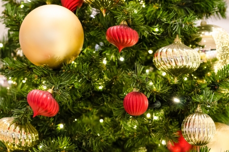 Closeup Photo Of Beautiful Christmas Tree Ornamentsの写真素材