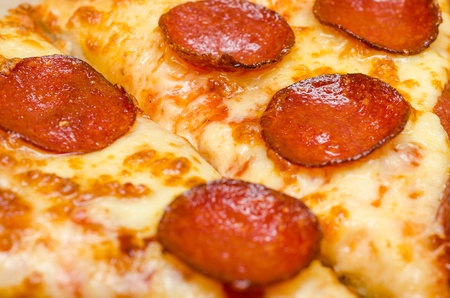Closeup Photo Of Pepperoni Pizza Sliceの写真素材