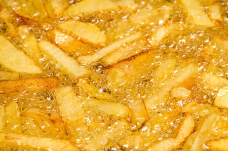 Frying French Fries In Boiling Oilの写真素材