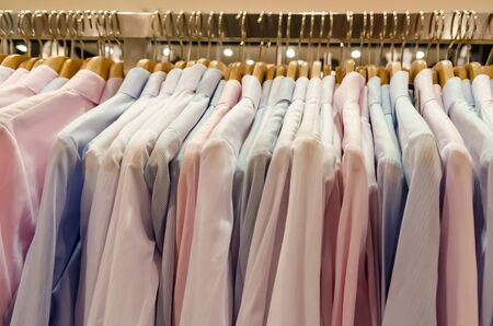 Man Shirts On Hanger In Dressing Roomの写真素材