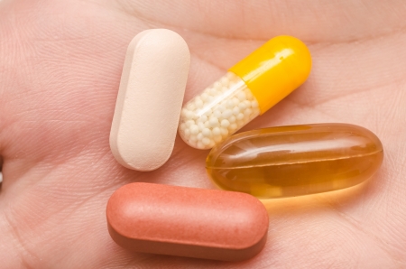 Hand Holding Everyday Treatment Pillsの写真素材