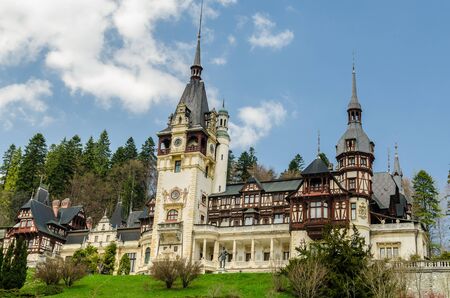 SINAIA, ROMANIA - APRIL 26: Peles Castle facade on April 26, 2013 in Sinaia, Romania. It is a Neo-Renaissance castle in the Carpathian Mountains built between 1873 and 1914.のeditorial素材