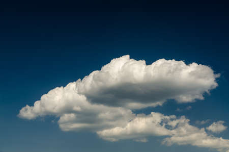 Summer White Cumulus Clouds And Blue Sky