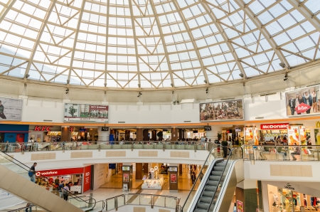 BUCHAREST, ROMANIA - JUNE 14: Plaza Romania Shopping Mall on June 14, 2013 in Bucharest, Romania. The building is based on an uncompleted hunger circus abandoned after the fall of Ceausescu in 1989.のeditorial素材