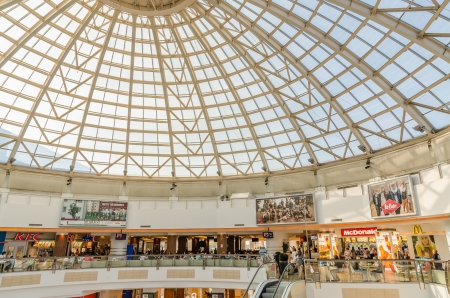 BUCHAREST, ROMANIA - JUNE 14: Plaza Romania Shopping Mall on June 14, 2013 in Bucharest, Romania. The building is based on an uncompleted hunger circus abandoned after the fall of Ceausescu in 1989.のeditorial素材