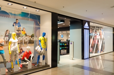 BUCHAREST, ROMANIA - JUNE 13: Adidas Store on June 13, 2013 in Bucharest, Romania. Is a German multinational corporation that designs and manufactures sports clothing and accessories based in Germany.のeditorial素材